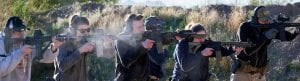 Line of people shooting assault rifles post cleaning firearms | calendar | CLEANING YOUR FIREARM